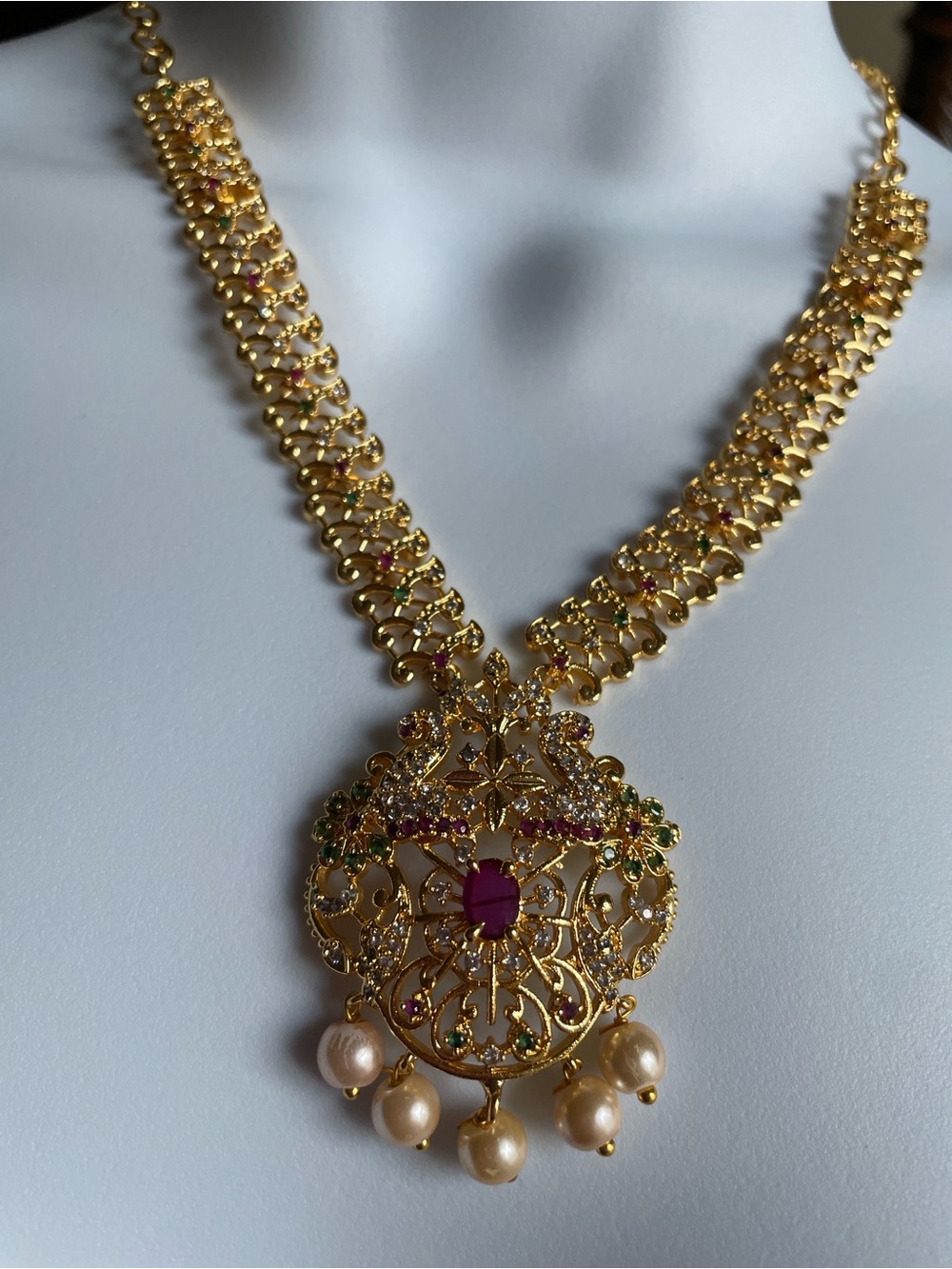 Gold-Tone Floral Filigree Pendant Necklace with Ruby Accents and Pearl Drops
